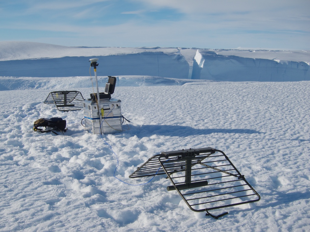 A remote radar study site on Pine Island Glacier showing radar instrument with crevasse in background
