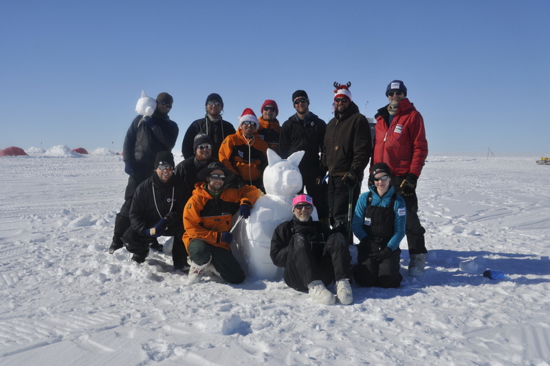 The iSTAR traverse team posing with their Christmas snow-pig. Photo: David Vaughan.