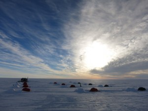 An iSTAR field camp, with living tents set up alongside the caboose. Photo: Damon Davies.